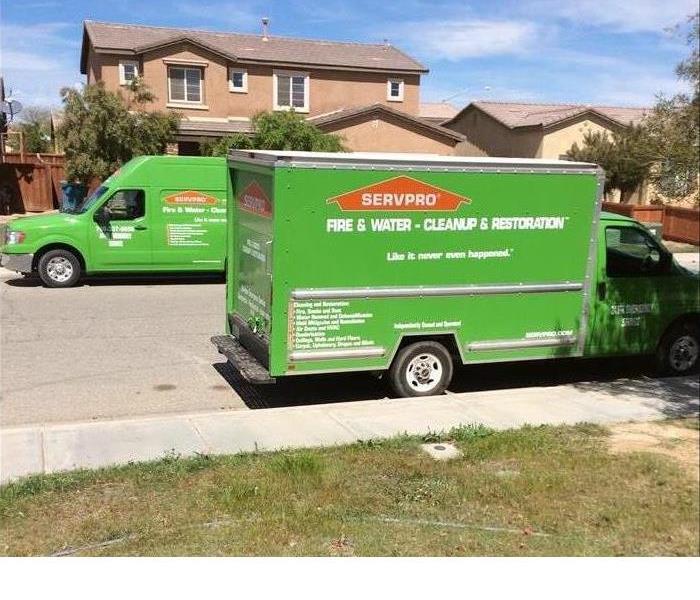 Two SERVPRO vehicle at a jobsite